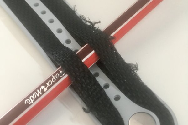 Photo of frayed and peeling watch strap
